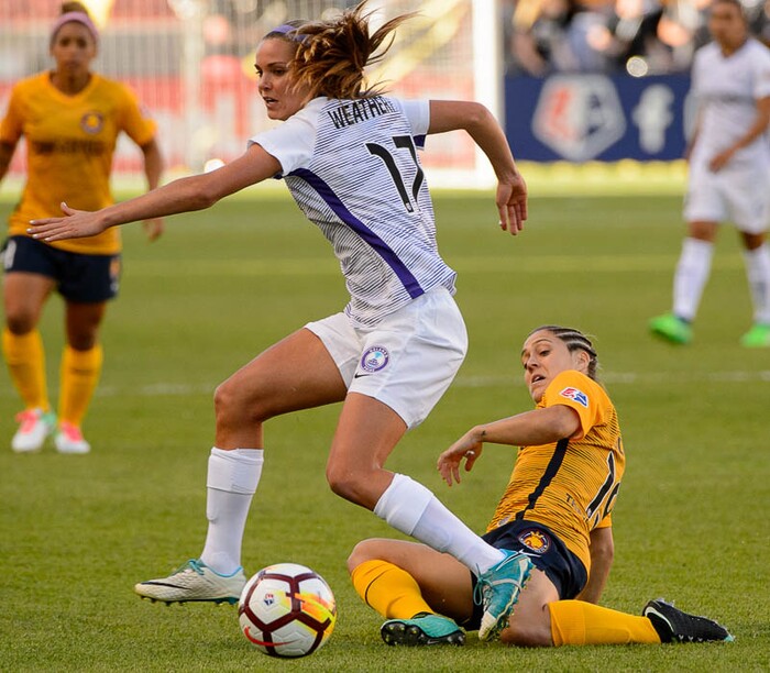 (Trent Nelson | The Salt Lake Tribune)  Utah Royals host Orlando Pride at Rio Tinto Stadium in Sandy, Wednesday May 9, 2018. Orlando Pride midfielder Dani Weatherholt (17) and Utah Royals FC midfielder Katrina Gorry (19).
