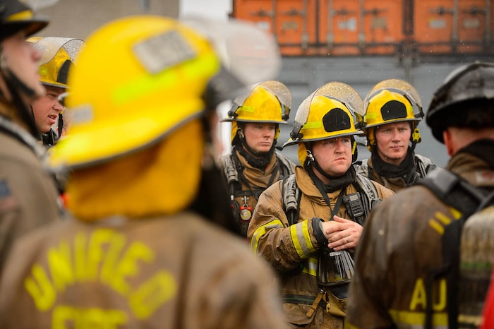 (Trent Nelson  |  The Salt Lake Tribune)  
Unified Fire recruits debrief after a live response to a vehicle and structure fire at the Unified Fire Authority Training Center in Magna on Tuesday April 16, 2019.