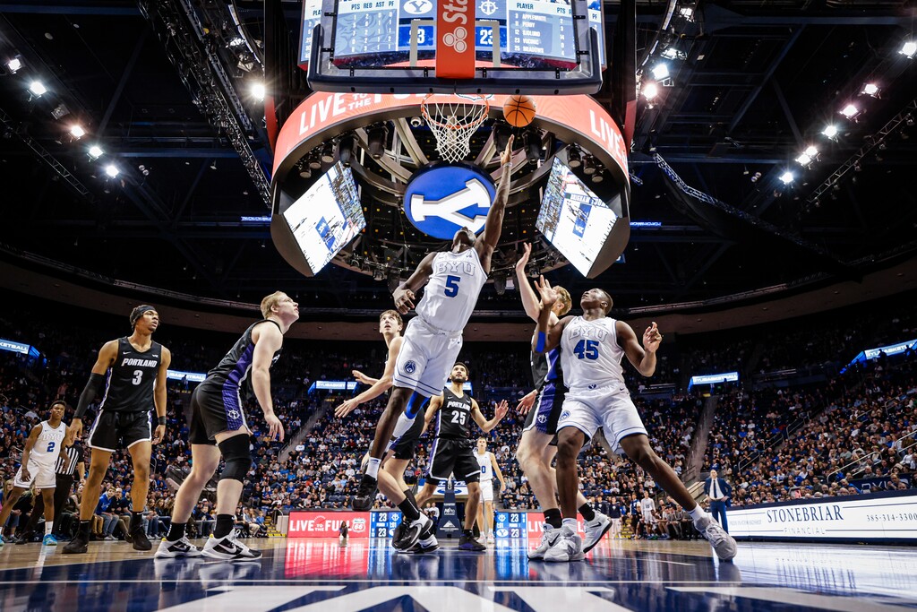 (BYU Athletics) BYU forward Gideon George goes up for a layup during a game against the Portland Pilots on Dec. 31, 2022, at the Marriott Center.