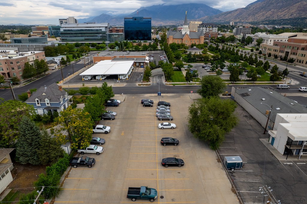 (Trent Nelson  |  The Salt Lake Tribune) A parking lot south of the Provo post office (visible at top center) on Thursday, Aug. 13, 2026.
