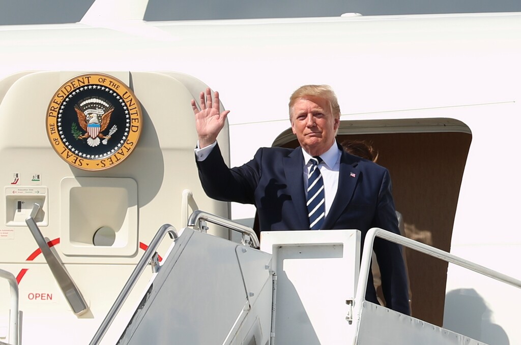 US President Donald Trump and first lady Melania arrives afetr landing at Shannon Airport, Ireland, on the first day of the president's visit to Ireland, Wednesday June 5, 2019. (Liam McBurney/PA via AP)