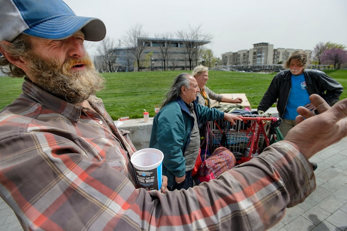 (Steve Griffin  |  The Salt Lake Tribune) David Rigby, front, who is homeless, talks about trying to find a place to sleep, including on the grounds of the Salt Lake City Main Library, in Salt Lake City Monday April 16, 2018. He was joined by Duane Valdez, Katherine Barrett and her husband Ronald Barrett Jr., back,  in voicing their concern about finding places to sleep. 