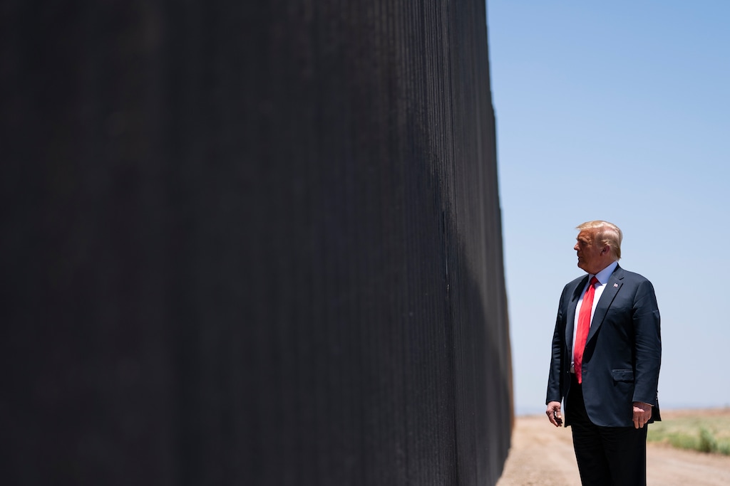 (Evan Vucci | AP file photo)  In this June 23 photo, President Donald Trump tours a section of the border wall in San Luis, Ariz.