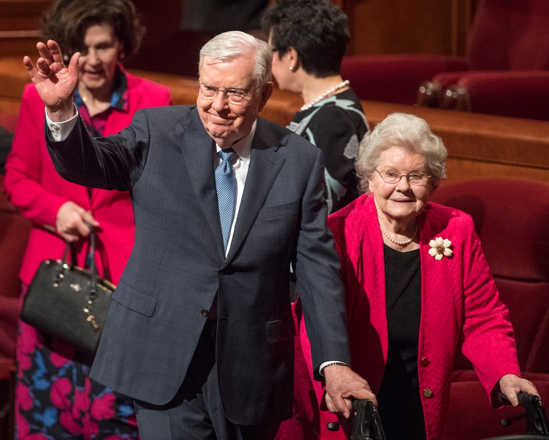 (Rick Egan | The Salt Lake Tribune) Elder M. Russell Ballard waves as he leaves the rostrum with his wife, Barbara, after General Conference in March 2018.