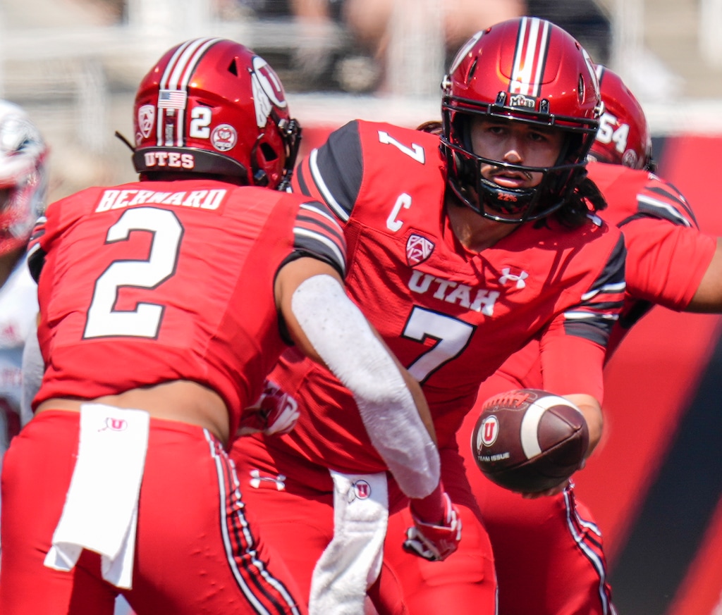 (Leah Hogsten | The Salt Lake Tribune) Utah Utes quarterback Cameron Rising (7) hands off to Utah Utes running back Micah Bernard (2) as the University of Utah host Southern Utah University at Rice-Eccles Stadium in Salt Lake City, Sept. 10, 2022. 