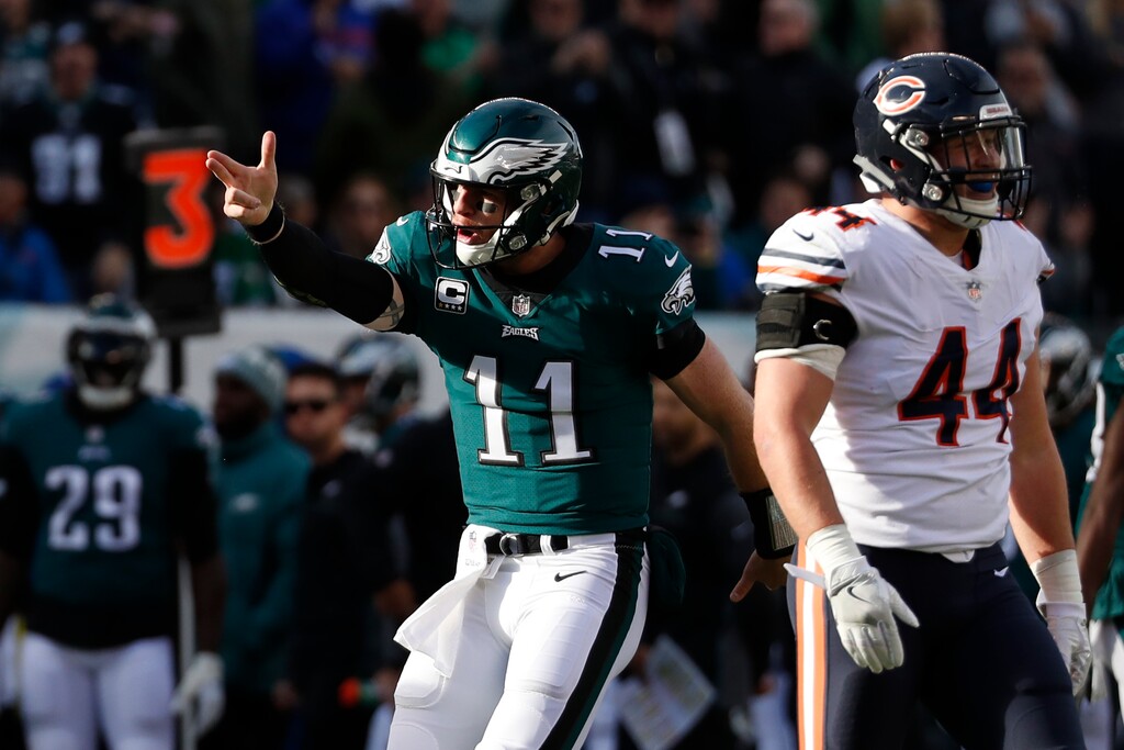 Philadelphia Eagles' Carson Wentz (11) reacts after running for a first down during the first half of an NFL football game against the Chicago Bears, Sunday, Nov. 26, 2017, in Philadelphia. (AP Photo/Chris Szagola)