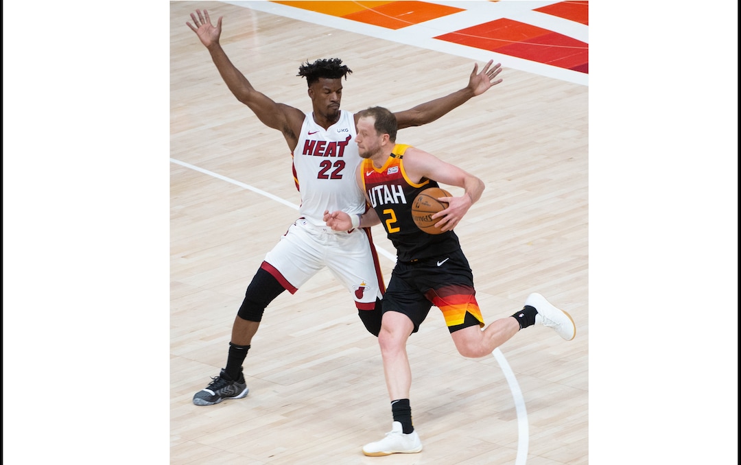 (Francisco Kjolseth  | The Salt Lake Tribune) Miami Heat forward Jimmy Butler (22) tries to slow down Utah Jazz forward Joe Ingles (2) as the Utah Jazz take on the Miami Heat at Vivint Smart Home Arena in Salt Lake City, on Saturday, Feb. 13, 2021.