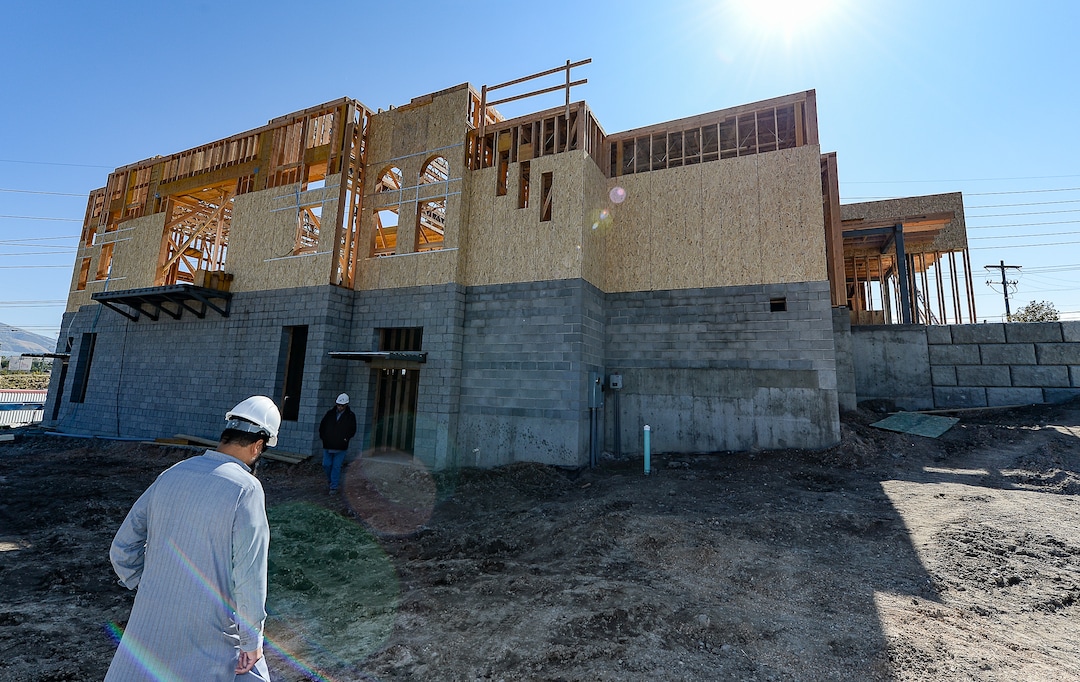 (Francisco Kjolseth  |  The Salt Lake Tribune)  Work continues on the site of the half-finished mosque going up in West Jordan at 984 W 9000 South on Tuesday, Oct. 1, 2019 as imam Shuaib Din takes a tour of work in progress.