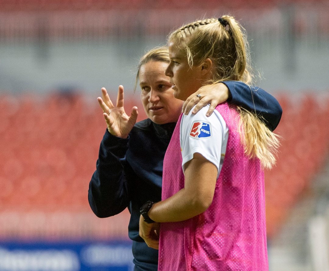 (Rick Egan  |  The Salt Lake Tribune)   Utah Royals FC midfielder Makenzy Doniak (13) talks to Royals head coach Laura Harvey, before going into the game, in soccer action between Utah Royals FC and Seattle Reign FC in Sandy, Friday, June 28, 2019.