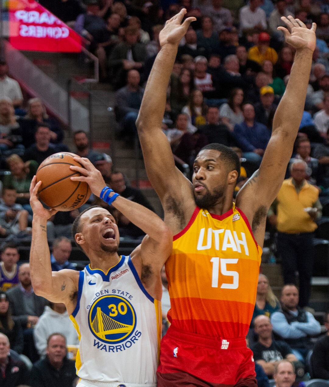 (Rick Egan  |  The Salt Lake Tribune)    Golden State Warriors guard Stephen Curry (30) looks for a shot, as Utah Jazz forward Derrick Favors (15) defends, in NBA action between Utah Jazz and Golden State Warriors, in Salt Lake City, Wednesday, Dec. 19, 2018.