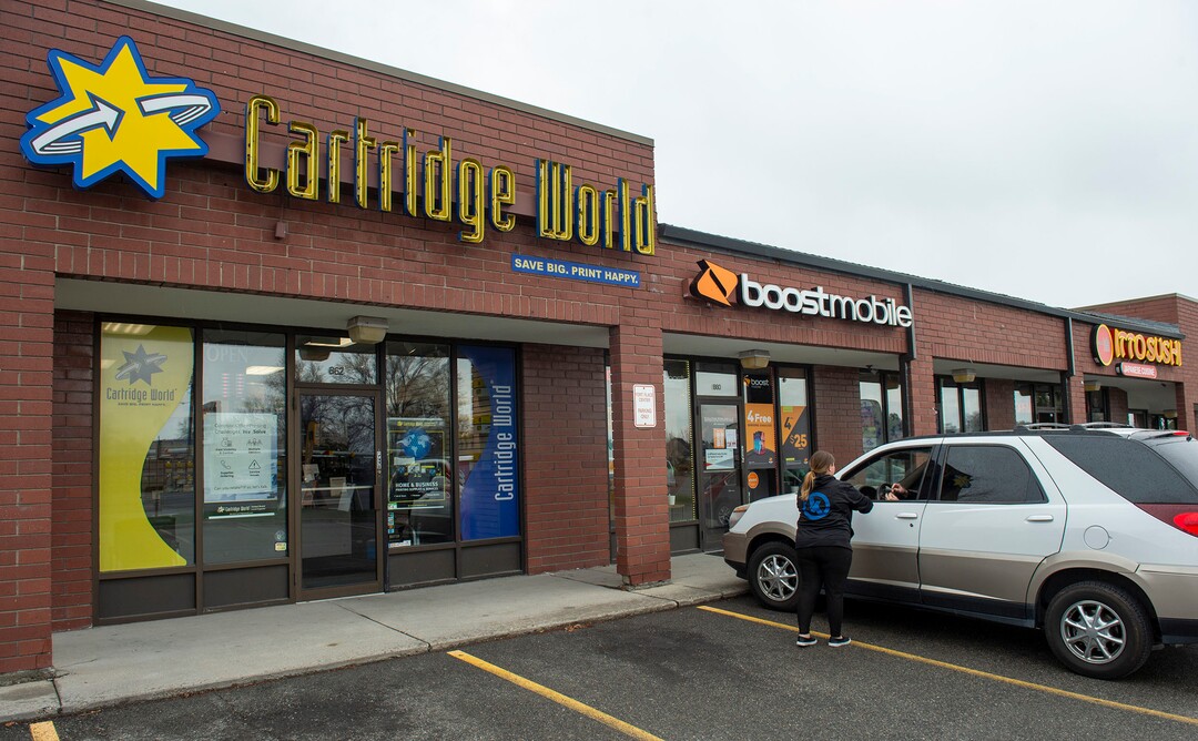 (Rick Egan  |  The Salt Lake Tribune)    Cartridge World in Midvale is feeling the the impact COVID-19 is having on small businesses, Wednesday, March 25, 2020.