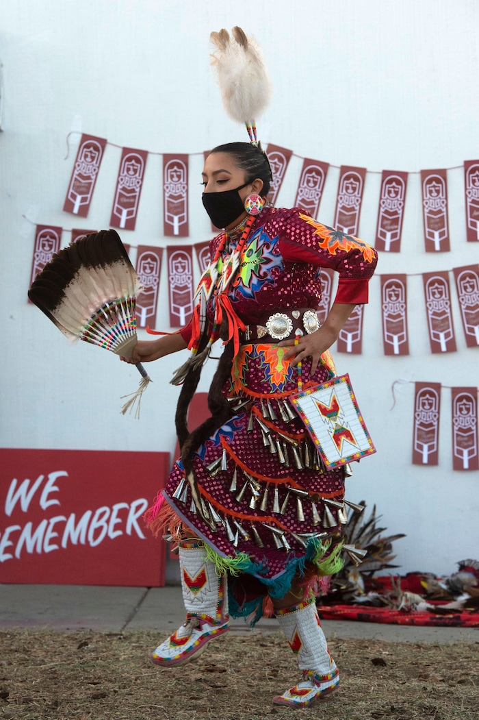 (Rick Egan  |  The Salt Lake Tribune)    
Shelly Etsitty does a jingle dance at the Indigenous Peoples Day celebration, on Monday, Oct. 12, 2020.

Shelly Etsitty does a jingle dance