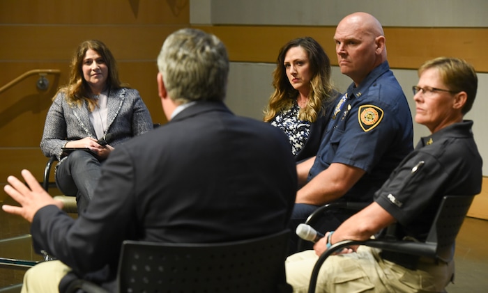 (Francisco Kjolseth | The Salt Lake Tribune) Tribune Editor Jennifer Napier-Pearce, left, moderates a conversation with police officers and firefighters about mental health at the Salt Lake Public Library on Thursday, May 24, 2018. Included in the conversation are Rep. Lee Perry, R-Perry, Shante Johnson, spokeswoman for the Utah State Lodge Fop (Fraternal Order of Police), Salt Lake City Fire Capt. Mike Stevens and Sgt. Lisa Pascadlo.