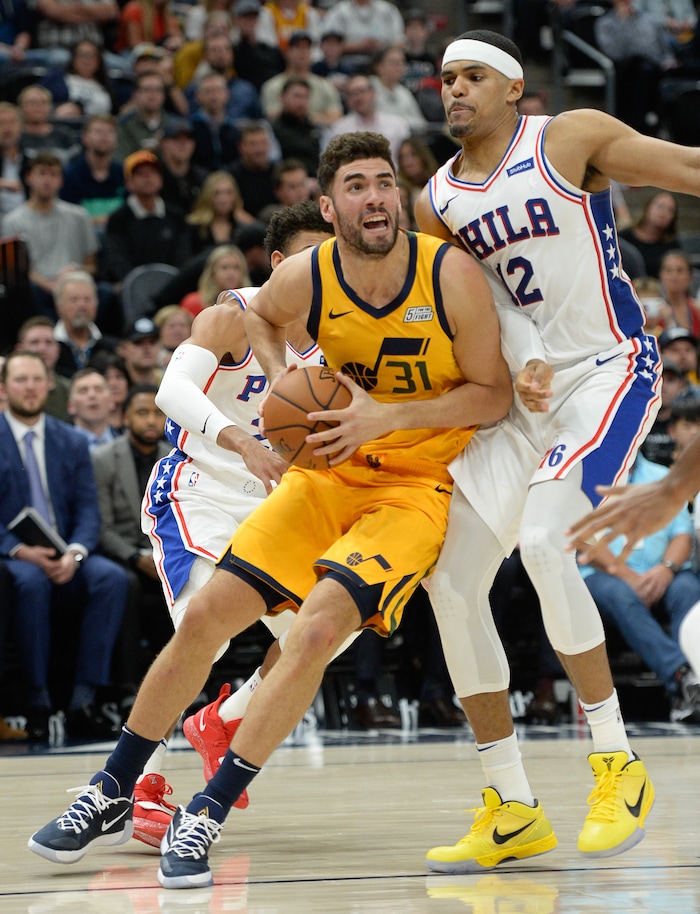 (Francisco Kjolseth  |  The Salt Lake Tribune)  Utah Jazz forward Georges Niang (31) pushes past Philadelphia 76ers forward Tobias Harris (12) as the Utah Jazz host the Philadelphia 76ers in their NBA basketball game at Vivint Smart Home Arena in Salt Lake City on Wednesday, Nov. 6, 2019.