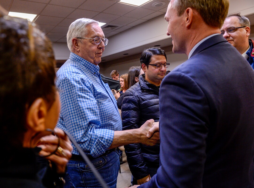 (Leah Hogsten  |  The Salt Lake Tribune)  Congressman Ben McAdams shakes hands with his constituents in the Lehi City Council chambers Tuesday evening during his second town hall in Utah County, Feb. 19, 2019.