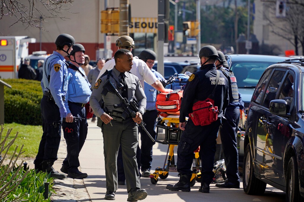 (Gene J. Puskar | AP Photo) Pittsburgh Police and paramedics respond to Pittsburgh Central Catholic High School for what turned out to be a hoax report of an active shooter, on Wednesday, March 29, 2023 in the Oakland neighborhood of Pittsburgh.