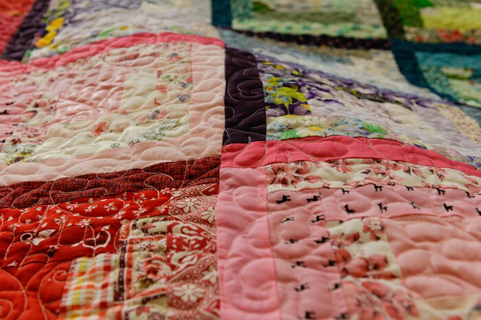 (Francisco Kjolseth  |  The Salt Lake Tribune)  Nacele Hart has made more than 100 quilts and numerous sewing projects over a 10-year period for her children, grandchildren and great-grandchildren. On Friday at a church in Orem her family put them on display with plans to hand them out Saturday to her loved ones. She's also currently battling cancer.