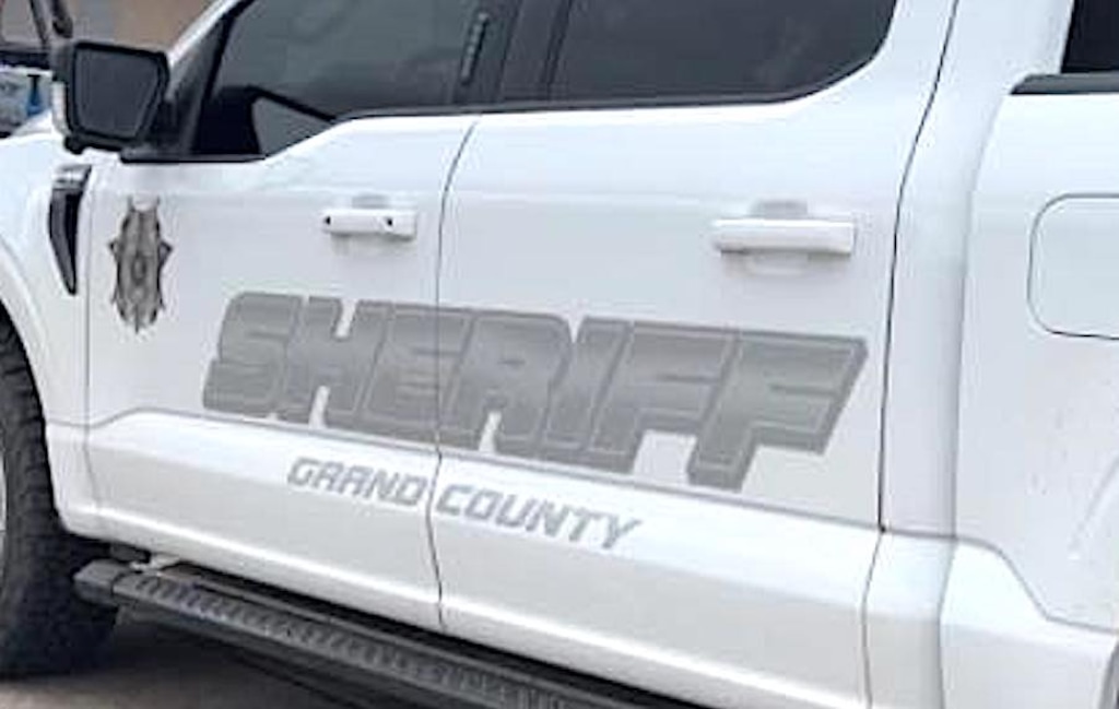(Grand County Sheriff's Office) A woman died and three others were injured when a family in a Razr went off a cliff near Moab.
