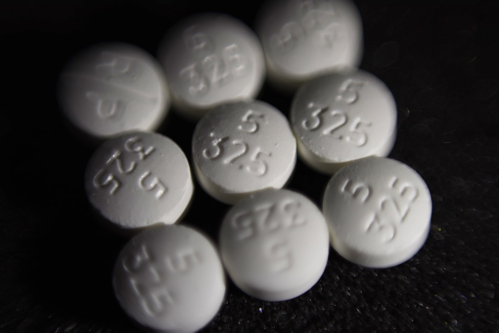 FILE - This Tuesday, Aug. 15, 2017 file photo shows an arrangement of pills of the opioid oxycodone-acetaminophen, also known as Percocet, in New York. Cities and counties of all sizes have sued companies that make and distribute prescription opioids. Among the plaintiffs so far: Philadelphia; the state of Ohio; Princeton, West Virginia; the Cherokee Nation; and a consortium of counties across Wisconsin. (AP Photo/Patrick Sison)