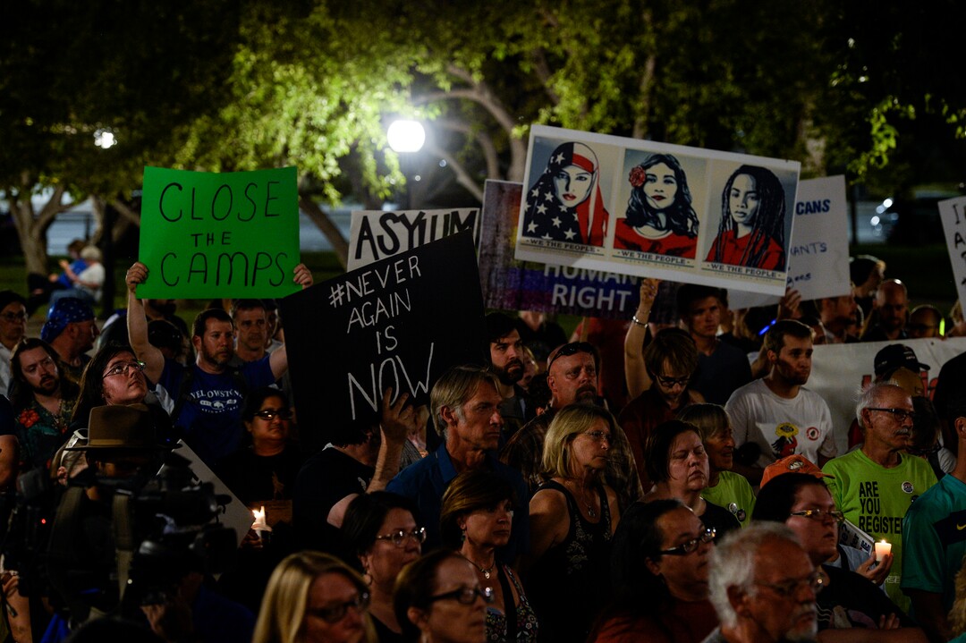 (Leah Hogsten  |  The Salt Lake Tribune) Over 150 people attended Lights for Liberty: A Vigil to End Human Detention Camps at Washington Square, July 12, 2019 to protest the inhumane conditions faced by refugees.