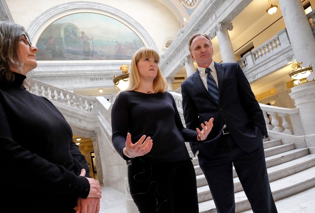 (Francisco Kjolseth  |  The Salt Lake Tribune) University of Utah Hospital nurse Alex Wubbels, center, is joined by her attorney Karra Porter and Rep. Craig Hall, R-West Valley, speaks with the media at the Utah Capitol after testifying in support of a bill that outlines when police can get blood draws. Rep. Hall, is sponsor of HB43 which passed out of committee on Wed. Jan. 31, 2018, and is the result of the widespread outrage after nurse Wubbels was arrested July 26 by Detective Jeff Payne who was trying to get a blood sample from a patient in her care. 