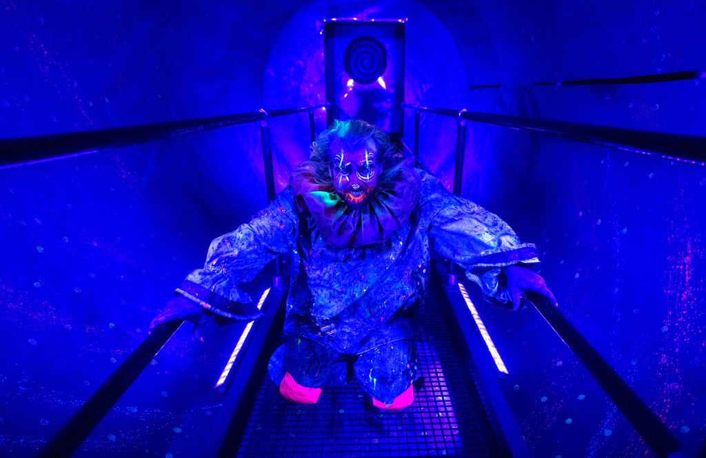 (Rick Egan | The Salt Lake Tribune) A clown surprises guest in a tunnel in the Industrial Clowns section of the Fear Factory on Saturday, Oct. 1, 2022. Fear Factory has scheduled a "Halfway to Halloween" event with a sneak preview of next Halloween's frights, May 17 and 18, 2024.