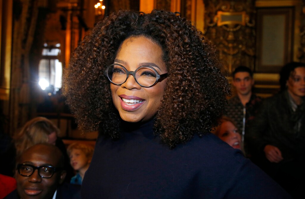 FILE - Oprah Winfrey arrives for the presentation of Stella McCartney's ready-to-wear Fall-Winter 2019-2020 fashion collection in Paris on March 4, 2019. AP Photo/Michel Euler, File)