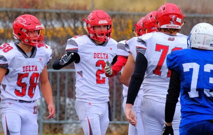 (Leah Hogsten  |  The Salt Lake Tribune) Delta's Trevor Burton pulls in the touchdown pass. Beaver High School boys' football team defeated Delta High School 35-16 during their class 2A state semifinal football game Saturday, November 4, 2017 at Weber State University's Stewart Stadium.
