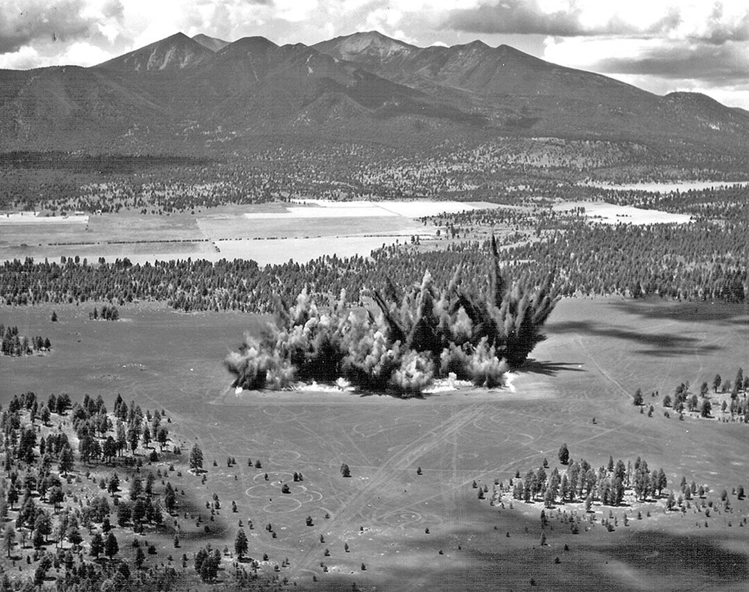 (U.S. Geological Survey Astrogeology Science Center via AP) This 1968 photo provided by the U.S. Geological Survey Astrogeology Science Center shows craters being created in a volcanic cinder field east of Flagstaff, Ariz. Astronauts who walked on the moon used the site for training.