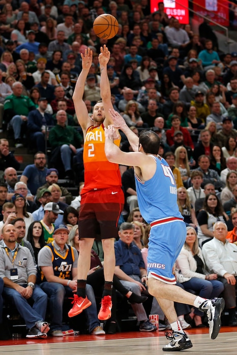 Utah Jazz forward Joe Ingles (2) shoots over Sacramento Kings center Kosta Koufos (41) during the second half of an NBA basketball game Saturday, March 17, 2018, in Salt Lake City. (AP Photo/Rick Bowmer)