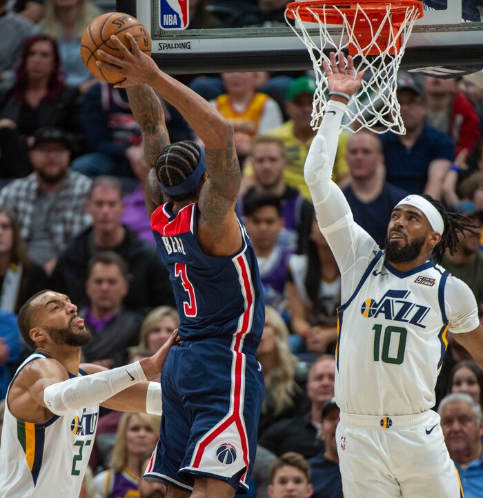 (Rick Egan  |  The Salt Lake Tribune)     Washington Wizards guard Bradley Beal (3) dunks the ball as Utah Jazz guard Mike Conley (10) defends, in NBA action between the Utah Jazz and the Washington Wizards, in Salt Lake City, Friday, February 28, 2020
