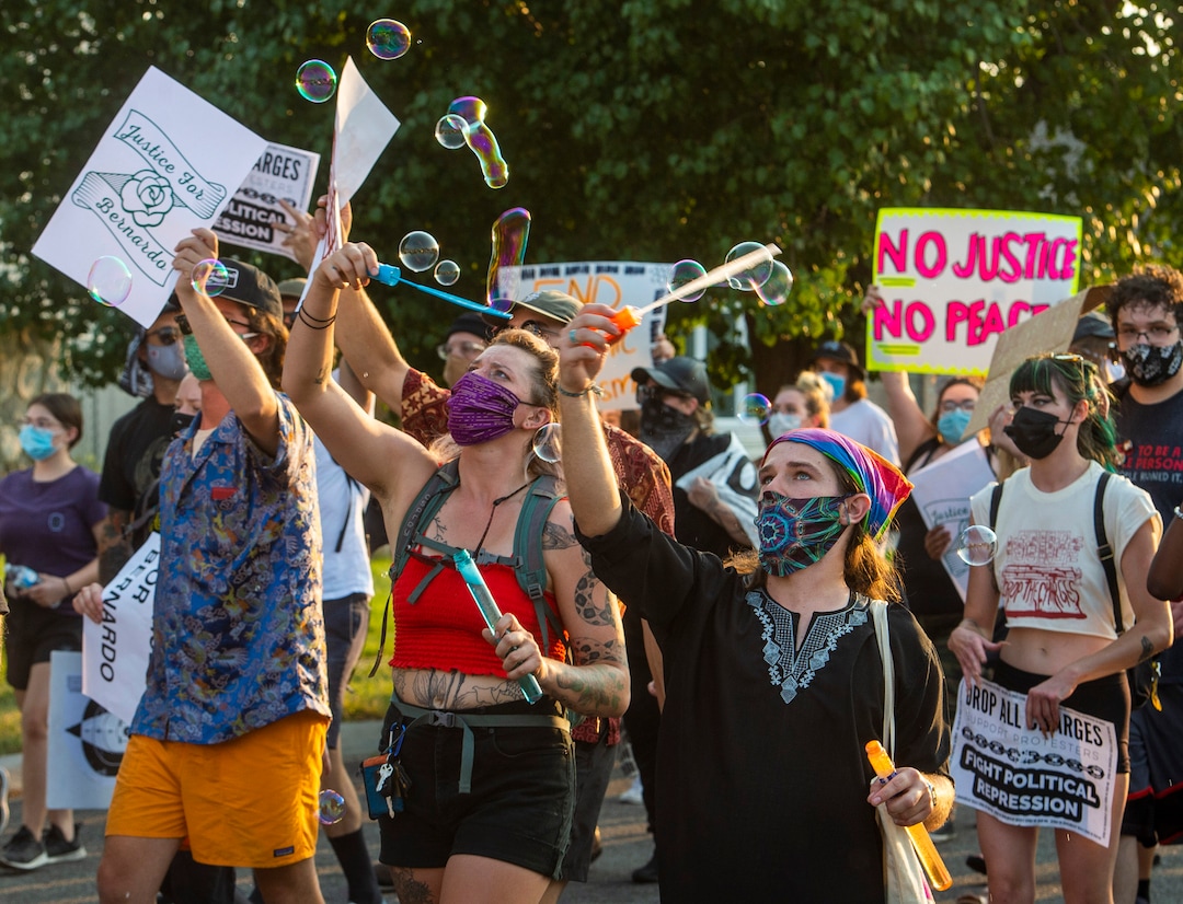 (Rick Egan  |  The Salt Lake Tribune)     Protesters dance through the neighborhood in Rose Park, during the Dance Dance for Revolution protest for racial equality, on Sunday, Aug. 23, 2020. The protest was in memory of Jovany Mercardo who was shot last August by Ogden police by four officers, hitting his body sixteen times.