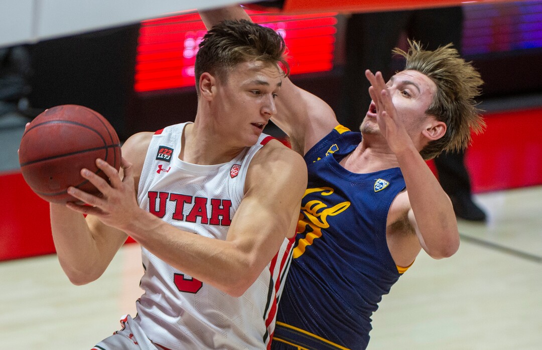 (Rick Egan | The Salt Lake Tribune) Utah Utes guard Pelle Larsson (3) is guarded by California Golden Bears guard Ryan Betley (00), in PAC12 Basketball action between the the Utah Utes and the California Golden Bears, on Wednesday, Jan. 16, 2021.