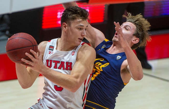 (Rick Egan | The Salt Lake Tribune) Utah Utes guard Pelle Larsson (3) is guarded by California Golden Bears guard Ryan Betley (00), in PAC12 Basketball action between the the Utah Utes and the California Golden Bears, on Wednesday, Jan. 16, 2021.