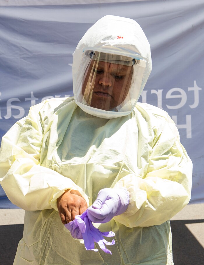 (Rick Egan  |  The Salt Lake Tribune)   Intermountain Healthcare medical assistant, Latoya Dovila, prepares for the next test at the Intermountain Healthcare Coronavirus Mobile Testing Unit at Utah Valley Hospital in Provo, Friday May 8, 2020.