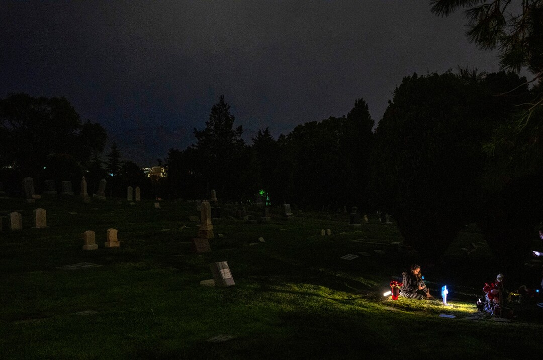 (Rick Egan | The Salt Lake Tribune) Karina the sister of Bernardo Palacios-Carbajal waits at Bernardo's grave for the group to arrive at the Salt Lake City Cemeterym after the "Long Live Loske" gathering at Rose Park on Saturday, May 22, 2021. The family of Bernardo Palacios-Carbajal hosted a "1st Heavenly Anniversary" event to celebrate the life of their son and brother to mark the 1-year anniversary of his death on May 23, 2020 by Salt Lake City Police, who fired 34 shots, killing the 22-year-old man.