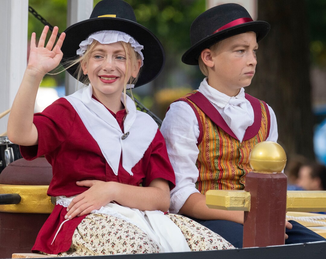 (Rick Egan | The Salt Lake Tribune)  Zoey 10, and  Dallin Bradshaw 12, ride on the Draper Utah Stake's "Maid of Iowa" float, in the Days of '47 Parade, in Salt Lake City, on Friday, July 23, 2021.