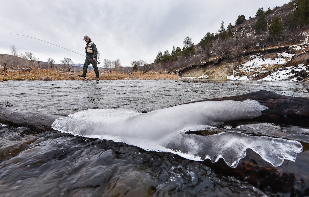 (Francisco Kjolseth | The Salt Lake Tribune) Brady Willison on Tuesday walks along an abraded channel on a stretch of the Upper Provo that cuts through the 7,000-acre Victory Ranch, a luxury destination near Francis.