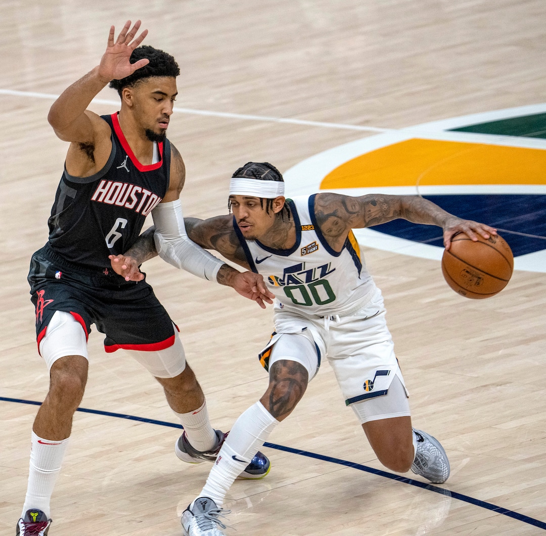 (Rick Egan | The Salt Lake Tribune) Houston Rockets forward Kenyon Martin Jr. (6) guards Utah Jazz guard Jordan Clarkson (00), in NBA action between the Utah Jazz and the Houston Rockets, at Vivint Arena, on Saturday, May 8, 2021.