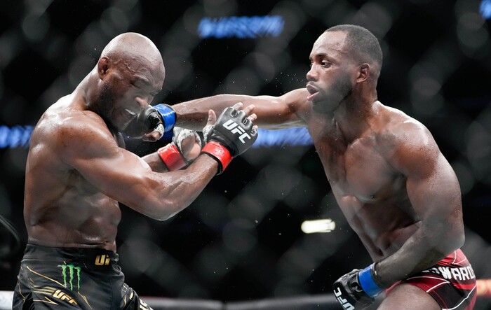 (Francisco Kjolseth | The Salt Lake Tribune) Nigerian UFC fighter Kamaru Usman, left, fights with UFC fighter Leon Edwards, of Jamaica, during the welterweight UFC 278 mixed martial arts title bout in Salt Lake City on Saturday, Aug. 20, 2022, before being knocked out by Edwards. Usman was knocked out in the fifth round relinquishing his title as welterweight champion of the world. 