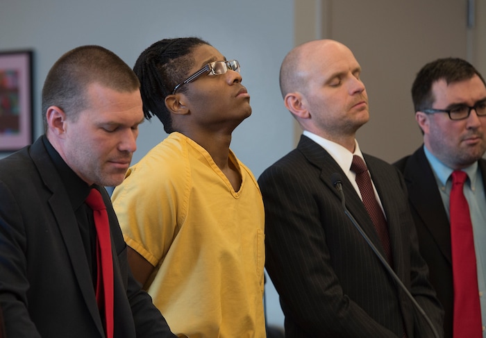 Scott Sommerdorf | The Salt Lake TribuneGerald Grant looks up as his defense team and 3rd District Judge Vernice Trease work their way toward reaching the final sentence for shooting and killing two men and a teenage boy inside an SUV in South Salt Lake nearly two years ago. Sentencing was in front of 3rd District Judge Vernice Trease, Thursday, March 8, 2018.