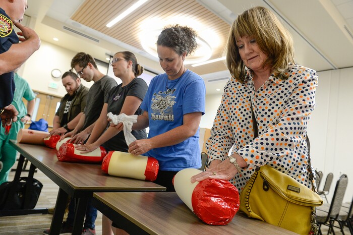 (Francisco Kjolseth | The Salt Lake Tribune) Suzanne Hall, a nurse from Cedar Hills quickly finds out how much gauze is required to pack a wound as she attends the 'Stop the Bleed' class at Utah Valley Hospital in Provo on Tuesday, June 5, 2018. Hall hopes to join the campaign and start teaching the class as well, where people learn the basic actions to stop life threatening bleeding following everyday emergencies, mass shootings or natural disasters.