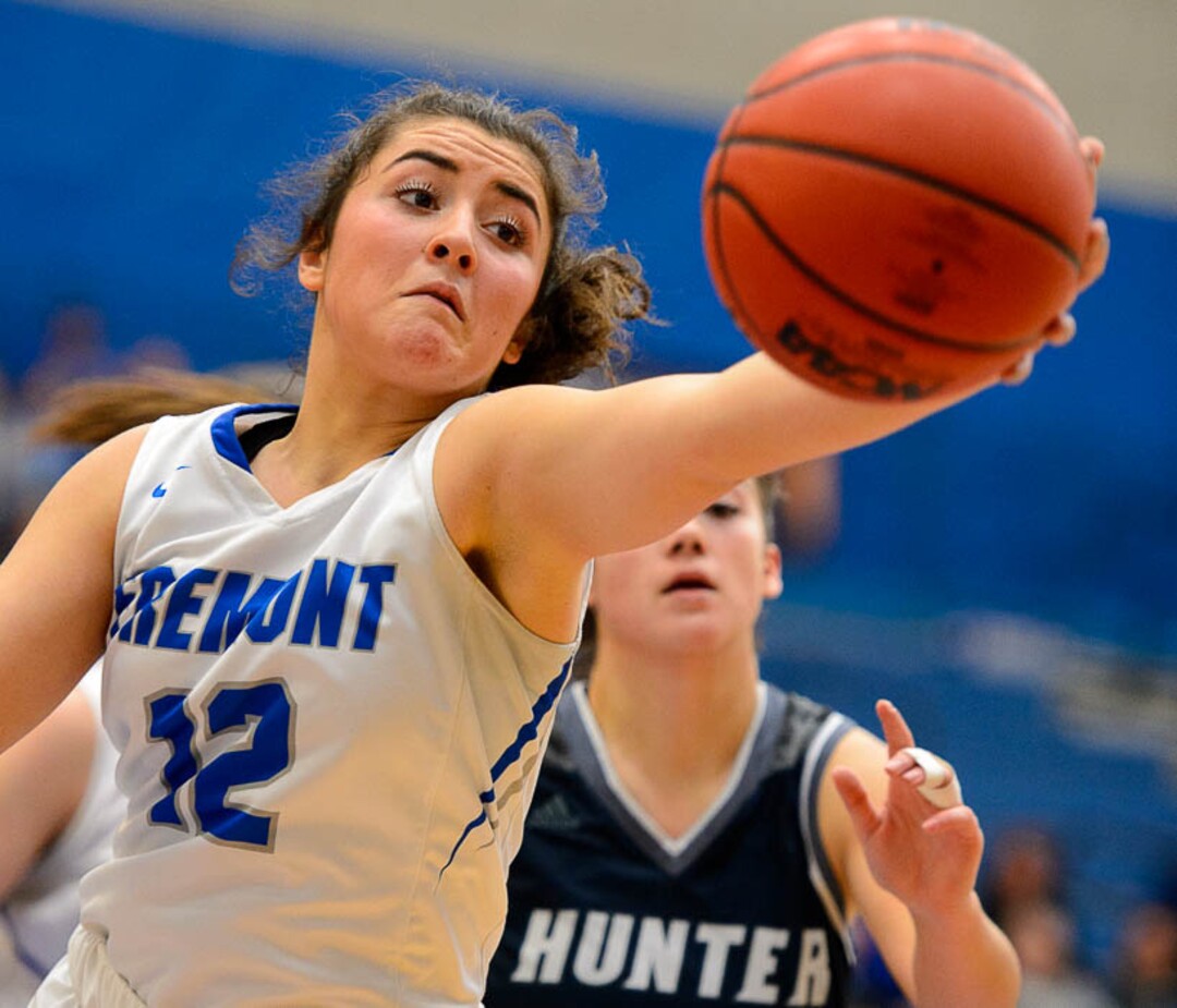 (Trent Nelson | The Salt Lake Tribune)  Fremont's Abby Broadbent (12) and Hunter's Tanzie Gasu (5) as Hunter faces Fremont in the 6A High School Girls' Basketball Tournament at SLCC in Taylorsville, Tuesday Feb. 20, 2018.