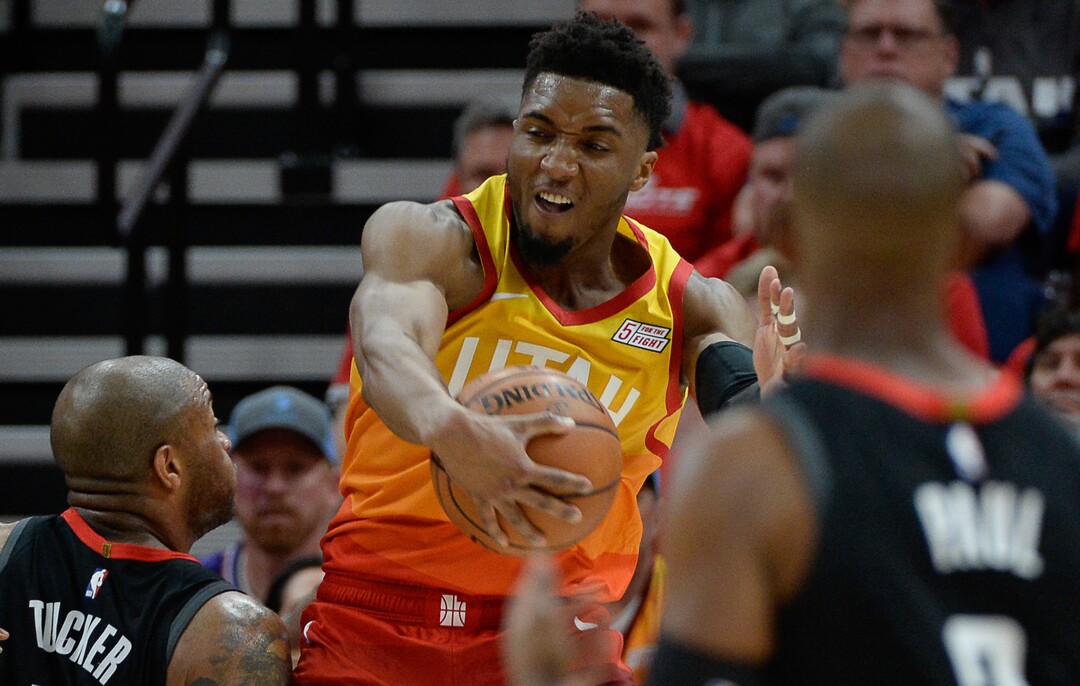 (Francisco Kjolseth  |  The Salt Lake Tribune)  Utah Jazz guard Donovan Mitchell (45) wins the rebound battle agains the Rockets in Game 3 of a first-round NBA basketball playoff series in Salt Lake City, Saturday, April 20, 2019.