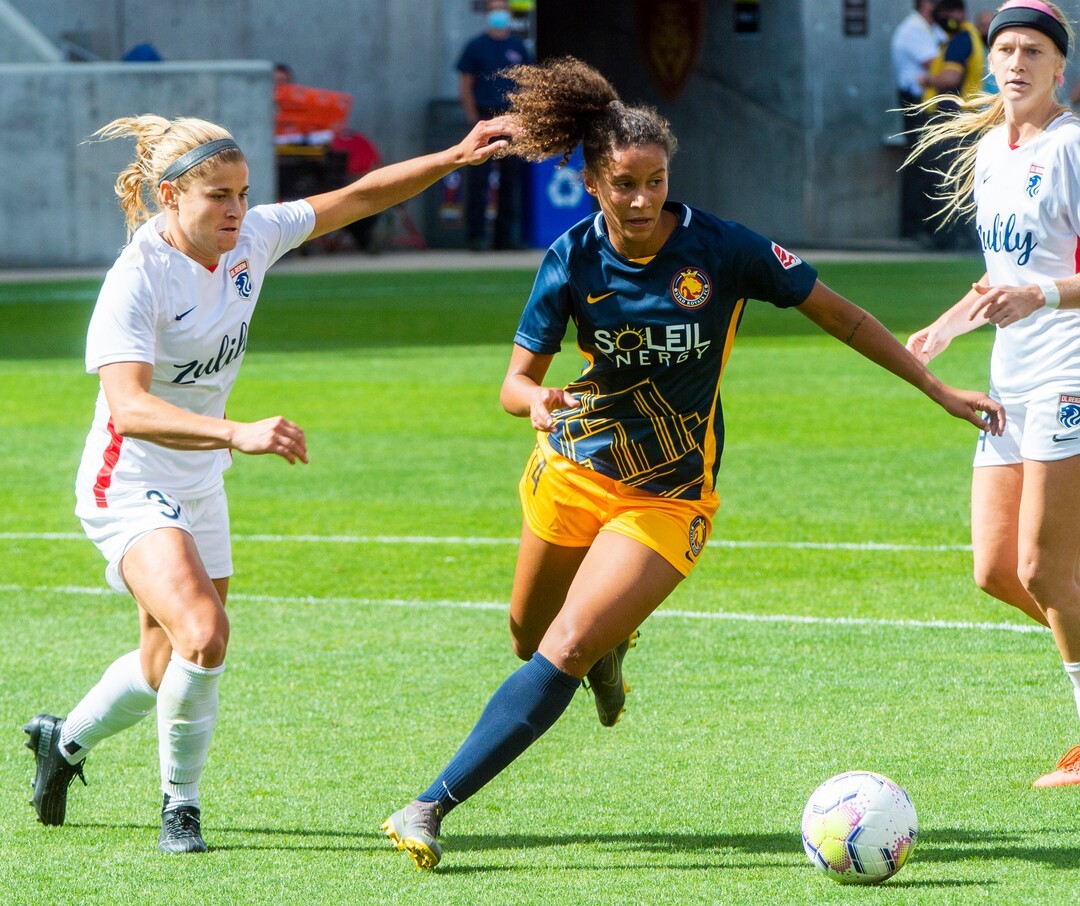 (Rick Egan  |  The Salt Lake Tribune)Utah Royals FC defender Gaby Vincent (14) goes for the ball,  in soccer action between Utah Royals FC and Ol Reign FC at Rio Tinto Stadium in Sandy, Saturday, Sept. 26, 2020.