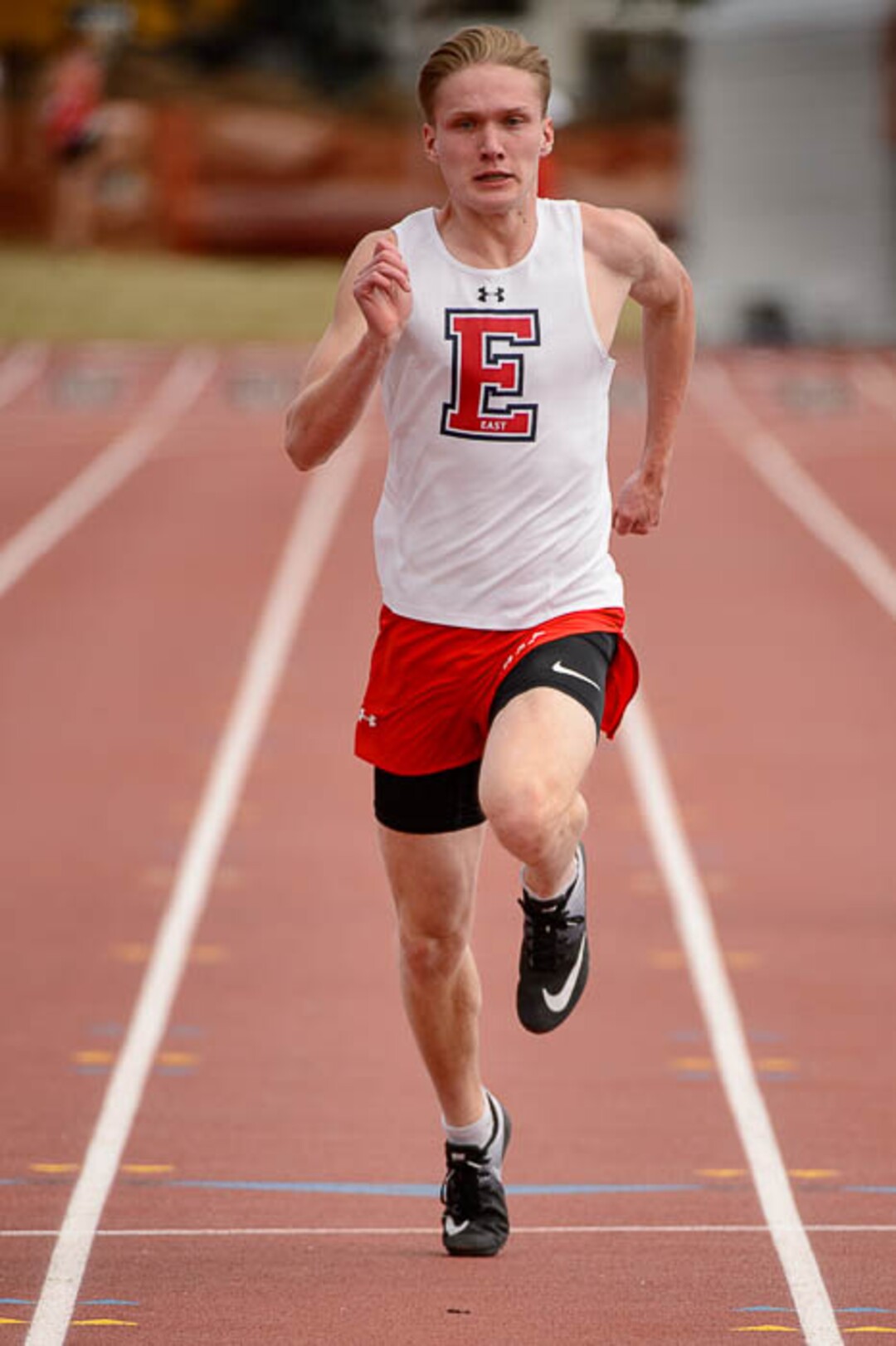 (Trent Nelson | The Salt Lake Tribune)  East track star Will Prettyman, one of the state's best long jumpers and sprinters, competing in the 100m, Thursday April 5, 2018.
