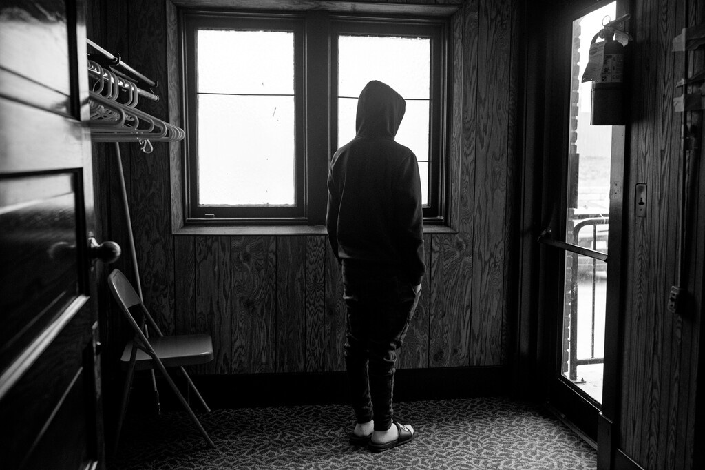 (Kirsten Luce for The New York Times) 

A 13-year-old boy who works 12-hour shifts, six days a week, at an egg farm outside Grand Rapids, Michigan.