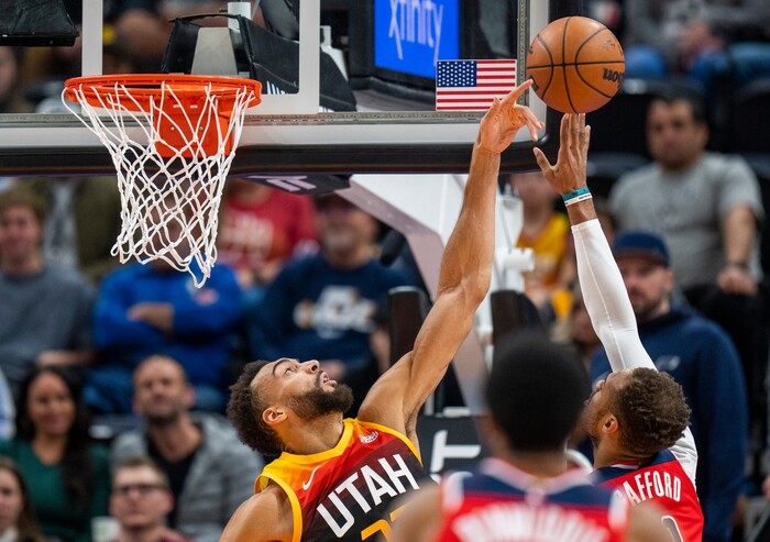 (Rick Egan | The Salt Lake Tribune) Utah Jazz center Rudy Gobert (27) blocks a shot by Washington Wizards center Daniel Gafford (21), in NBA action between the Utah Jazz and the Washington Wizards, at Vivint Arena on Saturday, Dec. 18, 2021.