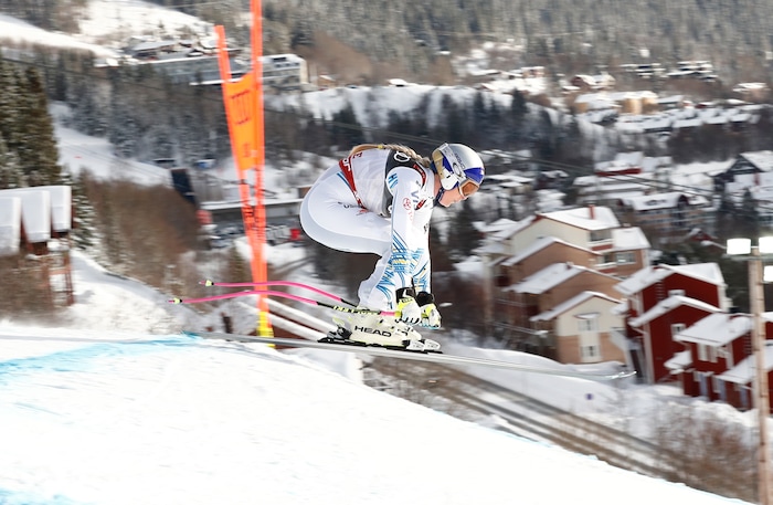 Lindsey Vonn speeds down the course during the women's downhill race, at the alpine ski World Championships in Are, Sweden, Sunday, Feb. 10, 2019. (AP Photo/Gabriele Facciotti)
