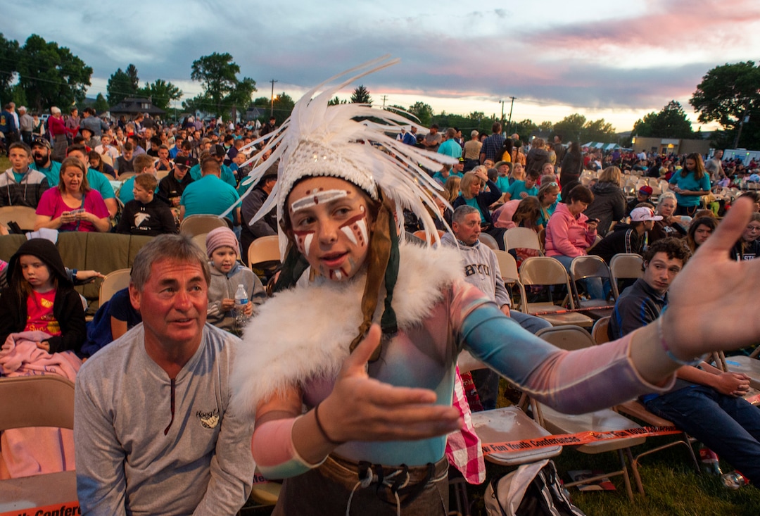 (Rick Egan  |  The Salt Lake Tribune)    Kevin Dunn, from Price, Utah, gets s preview of some of the action that will take place from Lamanite dancer Talia Cluff, 15, as actors mix with the audience before the Mormon Miracle Pageant Wednesday, June 12, 2019.  The final run for the pageant continues through Saturday, June 22.